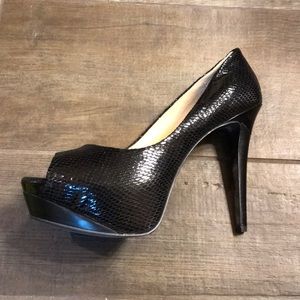 Brand new snake print leather platform heels.
